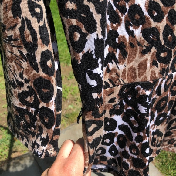 Almost Famous leopard peplum blouse size S - Picture 6 of 6